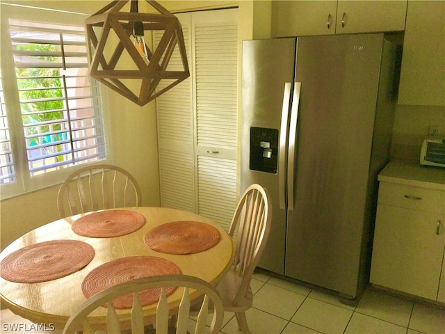 dining room featuring light tile patterned floors