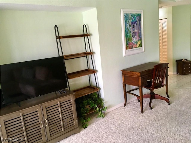 interior space featuring light carpet