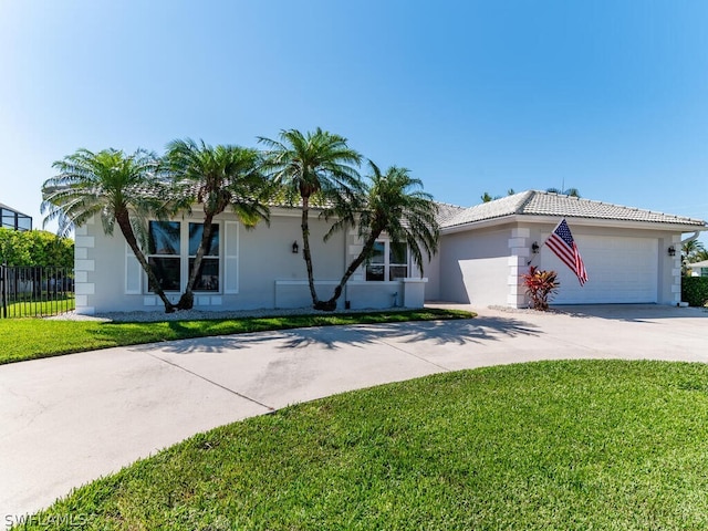 ranch-style house with a front lawn and a garage