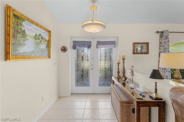 interior space featuring french doors and light tile patterned flooring