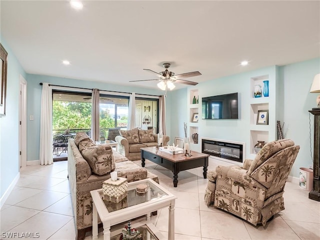 living room with ceiling fan, light tile patterned floors, and built in features