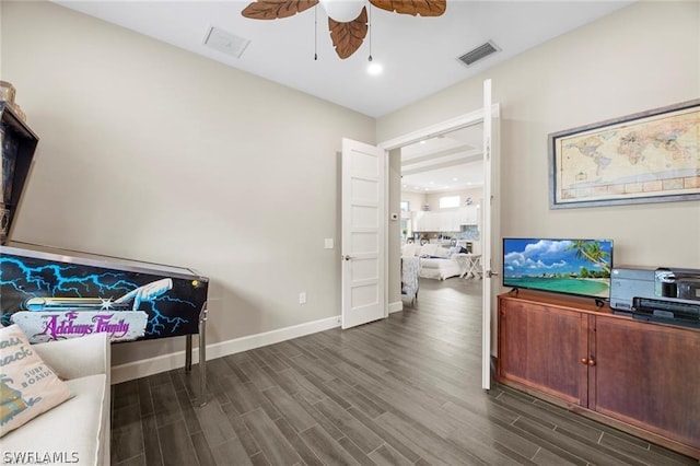 office area featuring ceiling fan and dark hardwood / wood-style floors