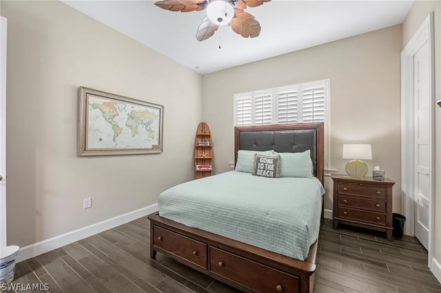 bedroom with ceiling fan and dark wood-type flooring