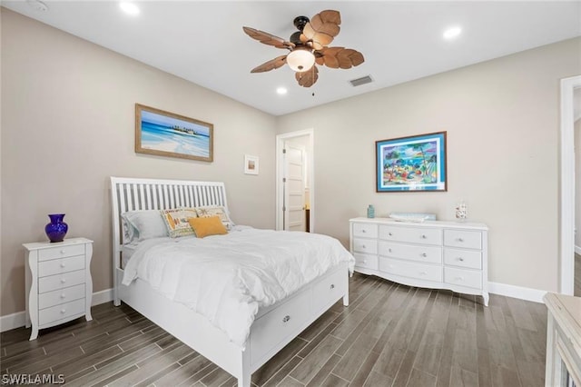 bedroom with ensuite bathroom and ceiling fan