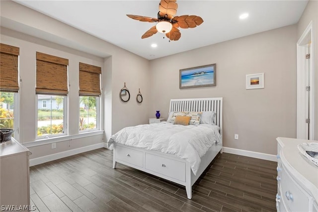 bedroom featuring ceiling fan and dark wood-type flooring