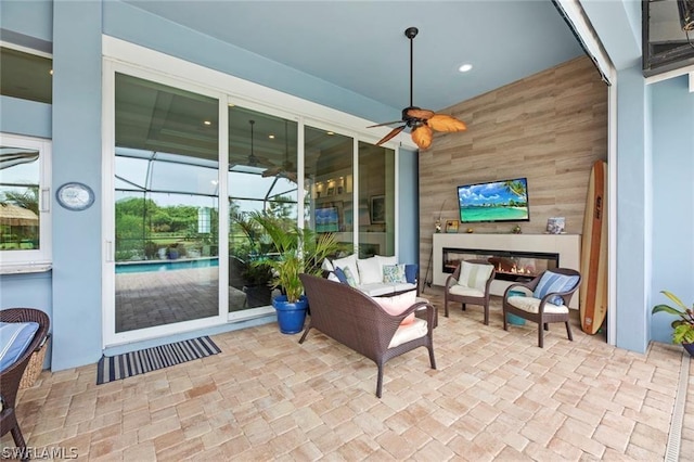 view of patio featuring ceiling fan