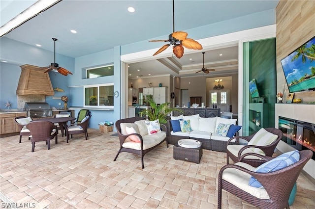 view of patio with grilling area and an outdoor hangout area