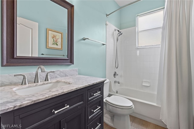 full bathroom featuring vanity, toilet, and shower / bath combo