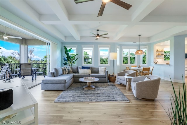 living room with beamed ceiling, ceiling fan, light hardwood / wood-style floors, and coffered ceiling