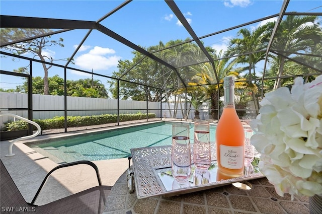 view of pool with a lanai