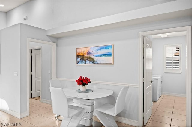 dining room featuring light tile patterned floors