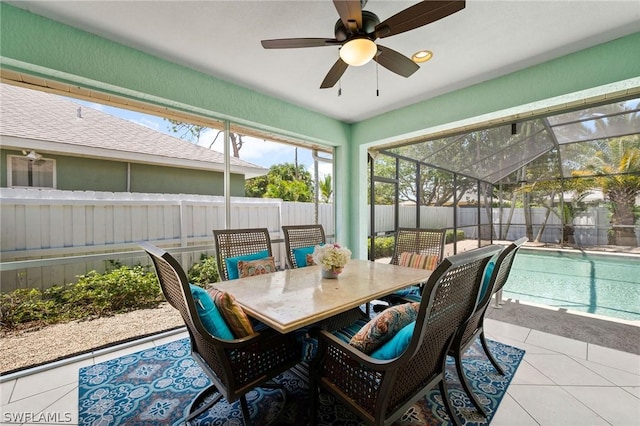 sunroom / solarium with ceiling fan