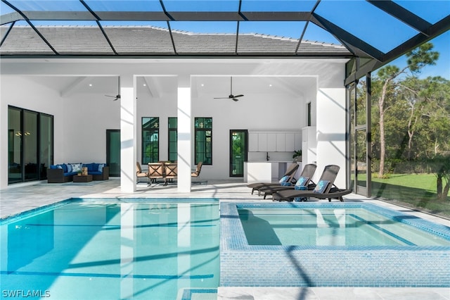 view of swimming pool featuring an outdoor living space, ceiling fan, and a patio area