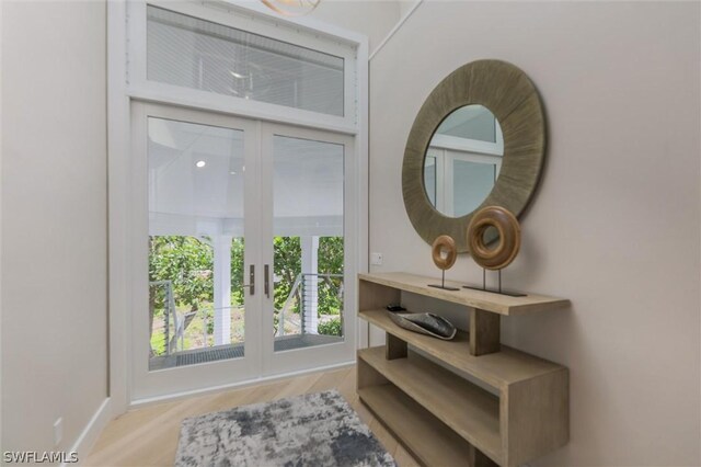 interior space featuring french doors and hardwood / wood-style floors