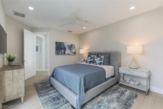 bedroom featuring ceiling fan and light hardwood / wood-style flooring