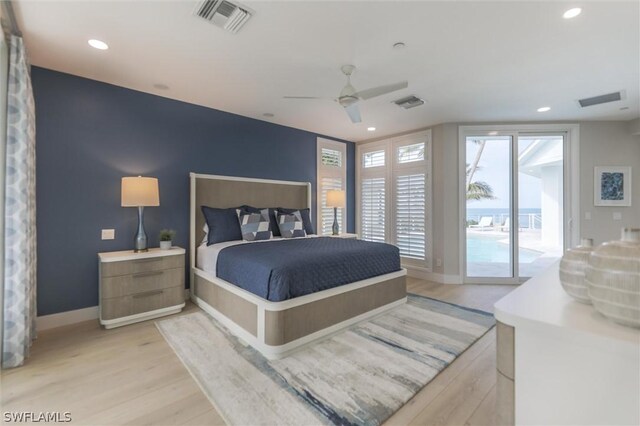 bedroom with access to exterior, ceiling fan, and light hardwood / wood-style flooring