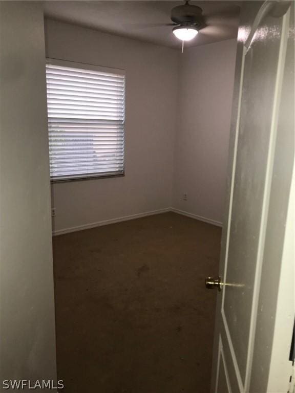 unfurnished room with ceiling fan