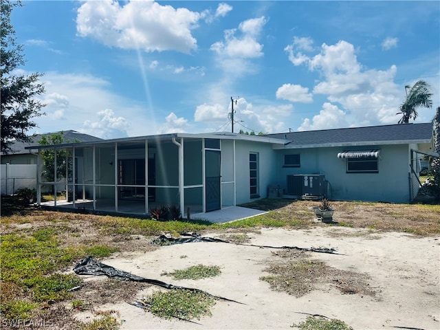 back of house with cooling unit