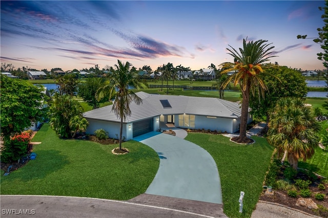 view of front of house with a lawn