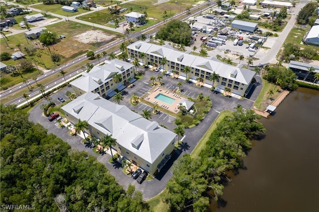 drone / aerial view with a water view