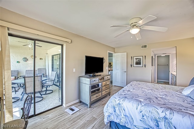 bedroom featuring ceiling fan, access to exterior, and light hardwood / wood-style flooring