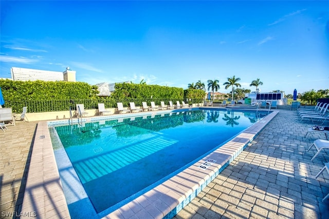 view of pool featuring a patio area