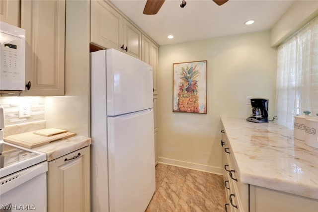 kitchen featuring tasteful backsplash, ceiling fan, and white appliances