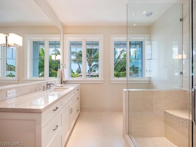 1270 Gulf Shore Blvd S, Naples, FL 34102 - full bath with tile patterned flooring, recessed lighting, vanity, baseboards, and an enclosed shower