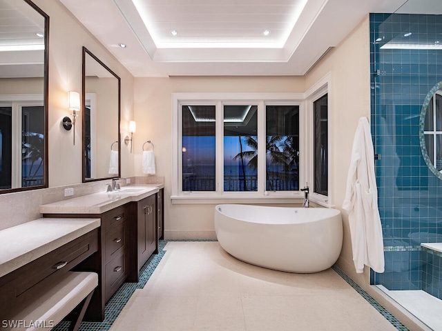 1270 Gulf Shore Blvd S, Naples, FL 34102 - full bath featuring tile patterned flooring, a freestanding tub, recessed lighting, vanity, and tiled shower