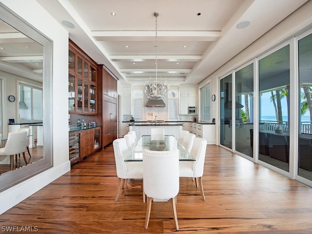 1270 Gulf Shore Blvd S, Naples, FL 34102 - dining room featuring wine cooler, wood finished floors, a chandelier, beam ceiling, and recessed lighting