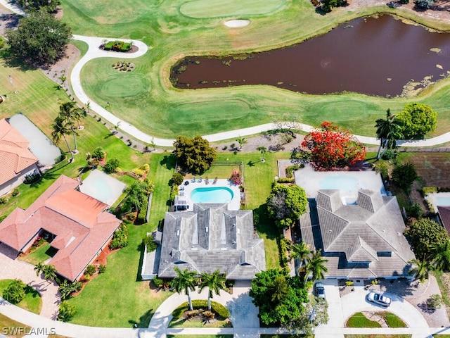 bird's eye view with a water view and view of golf course