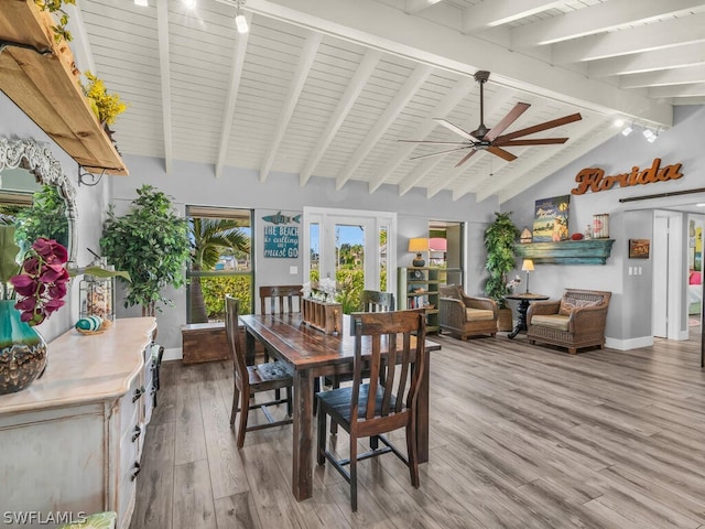 dining space featuring ceiling fan, beam ceiling, hardwood / wood-style flooring, and high vaulted ceiling