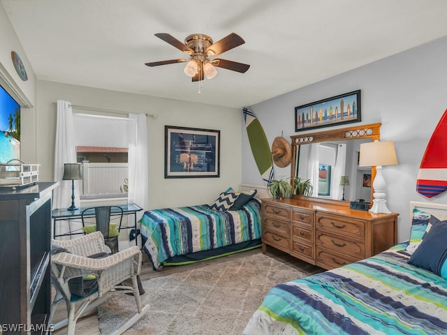 bedroom featuring carpet flooring and ceiling fan