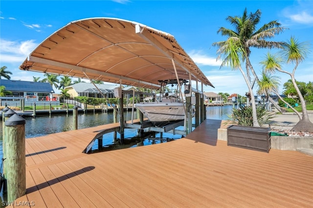 dock area with a water view