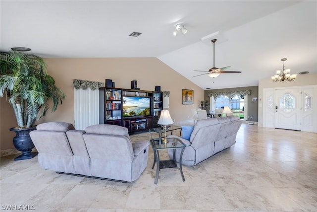 living room with ceiling fan with notable chandelier and vaulted ceiling