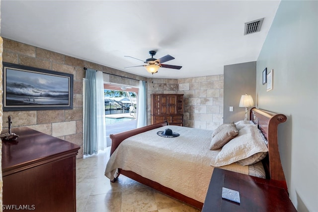 bedroom featuring access to outside and ceiling fan