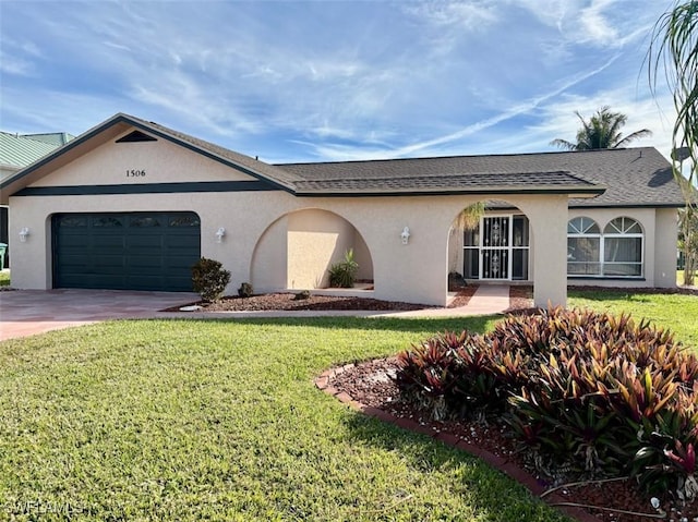 ranch-style house with a garage and a front lawn