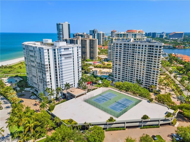 bird's eye view with a beach view and a water view