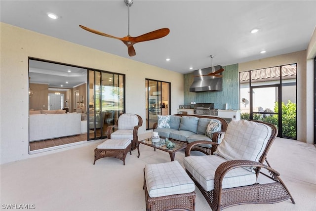 living room featuring ceiling fan and light carpet