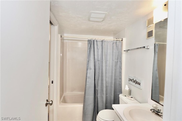 full bathroom featuring vanity, a textured ceiling, toilet, and shower / bathtub combination with curtain