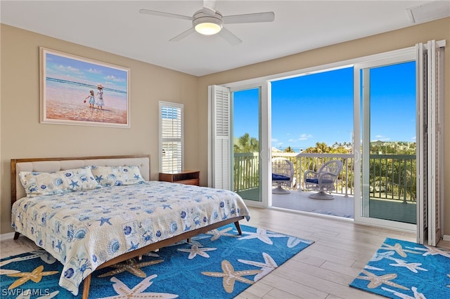 bedroom featuring ceiling fan, access to exterior, and light wood-type flooring