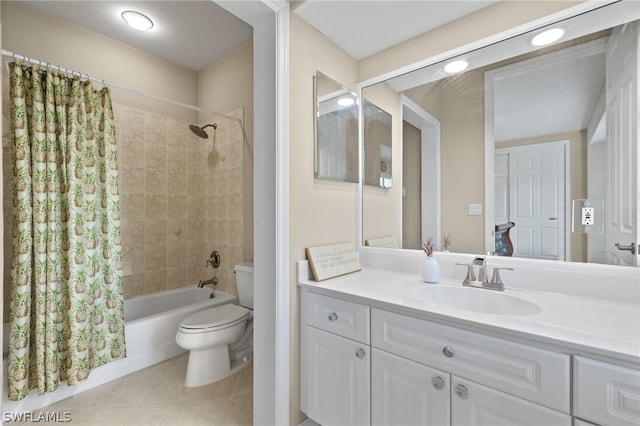 full bathroom with shower / bath combo, toilet, tile patterned flooring, and vanity