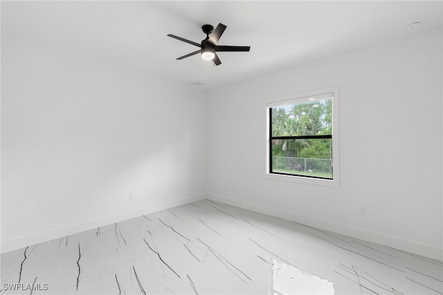 spare room featuring ceiling fan