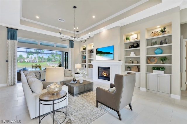 living room featuring ornamental molding, built in features, a notable chandelier, and light tile patterned flooring