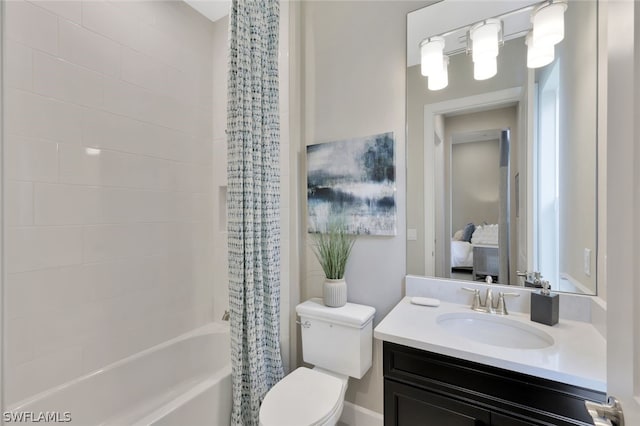 full bathroom featuring vanity, toilet, and shower / tub combo