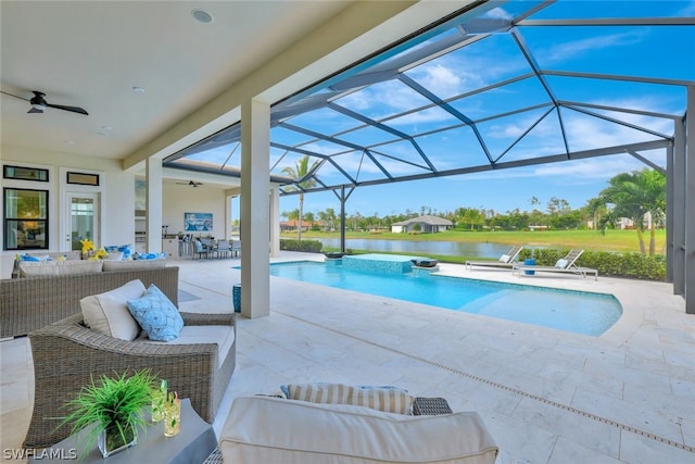 view of pool featuring an outdoor hangout area, a water view, glass enclosure, and a patio area