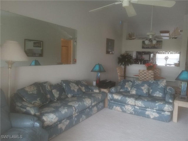 living room featuring ceiling fan and carpet floors