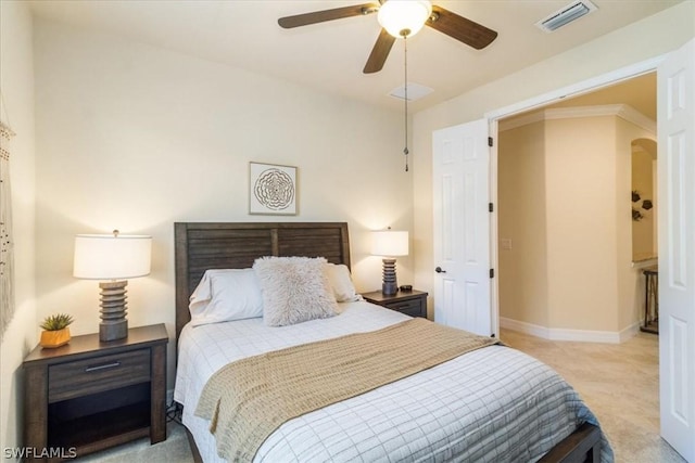 bedroom featuring visible vents, a ceiling fan, baseboards, and carpet floors