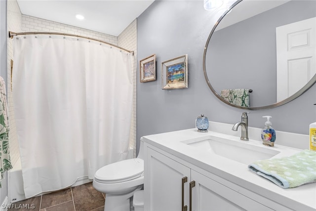 full bathroom with shower / tub combo with curtain, vanity, and toilet