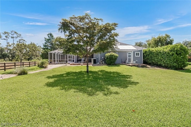 view of yard featuring a lanai